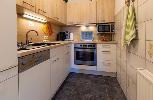 Langewiese Apartamento | Apartamento moderno de 61 m2 con sauna y terraza, a ras del suelo.