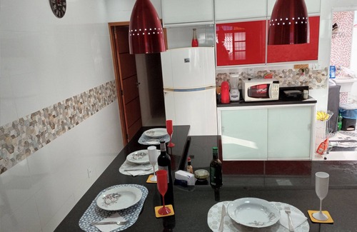 Real Casa | Modern and cozy house with fireplace and heated pool just 50m from the beach