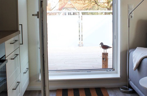 Langeoog Apartamento | Apartamento moderno y bien amueblado en Langeoog con 2 balcones.