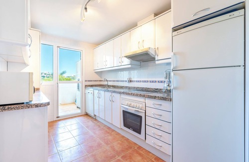 La Cala de Mijas Apartamento | Moderno apartamento 'In Jardin Botanico' con vistas al mar, piscina, Wi-Fi, jardín y terraza.