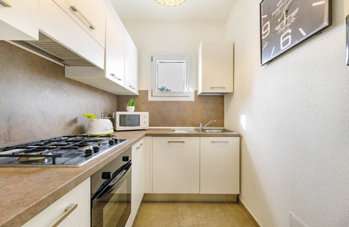 Monte Petrosu Apartamento | moderno apartamento a 5 min del mar con piscina, aire acondicionado y wi-fi