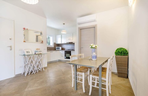 Monte Petrosu Apartamento | apartamento moderno a 5 min. del mar con piscina, aire acondicionado y wi-fi
