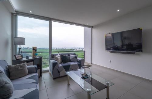 Tlajomulco de Zuniga Apartamento | Modern Apartment with Terrace and Pool Access
