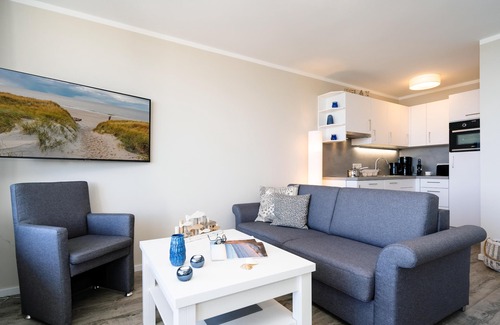 List Apartamento | Modern app. with balcony, sea view, parking space, WLAN. Pets allowed.