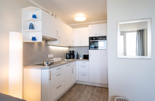 List Apartamento | Modern app. with balcony, sea view, parking space, WLAN. Pets allowed.