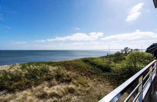 List Apartamento | Modern app. with balcony, sea view, parking space, WLAN. Pets allowed.