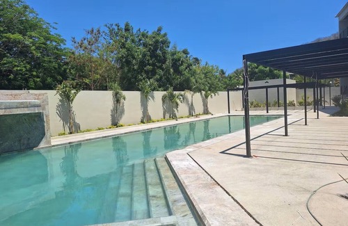 P Chahue Apartamento | Modern Apt with Pool - 5 Min walk to Chahue Beach