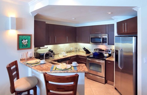 Dover Condominio | Condominio moderno frente a la playa con piscina - Sapphire Beach 209