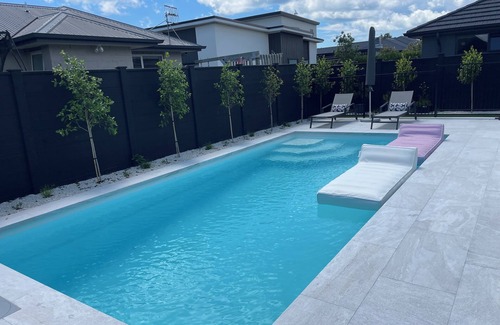 Papamoa Beach Casa | Modern Beachside Oasis with Private Heated Pool - Pet Friendly!