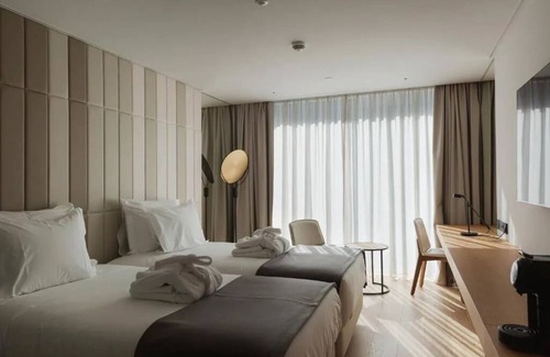 Sao Jorge de Arroios Hotel | Modern Comfort & Style | Pool, Gym & Lisbon Light Show Experience
