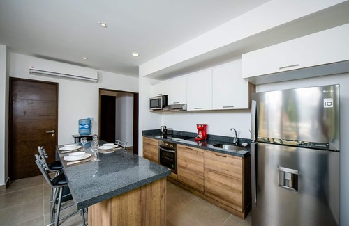 Akumal Condominio | Condominio moderno en la comunidad cerrada. Piscina, WiFi en un magnífico entorno tropical y tranquilo
