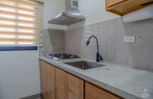 La Paz Condominio | Modern Condo, Pools, Private BBQ, Malecon 4 Blocks