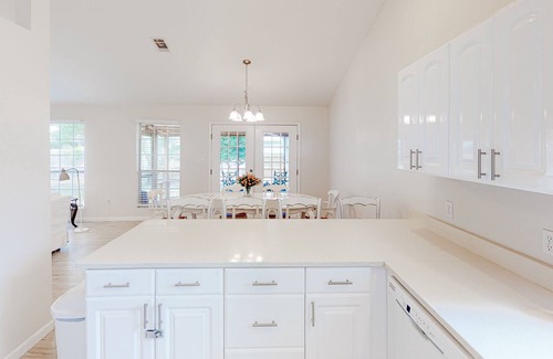 Gulfview Heights Casa | Modern dog-friendly home near the Gulf with yard, grill, screened porch & bikes