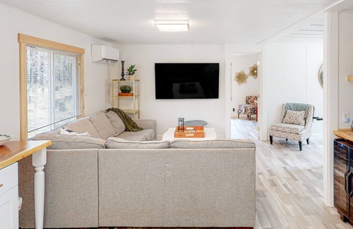 Blue River Cabina | Modern dog-friendly cabin with private deck, foosball, grill, AC, & W/D