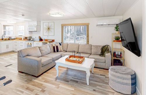 Blue River Cabina | Modern dog-friendly cabin with private deck, foosball, grill, AC, & W/D