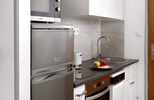 Corvin negyed Apartamento | Modern, elegant downtown apartment offers 5-star hotel quality luxury bedding