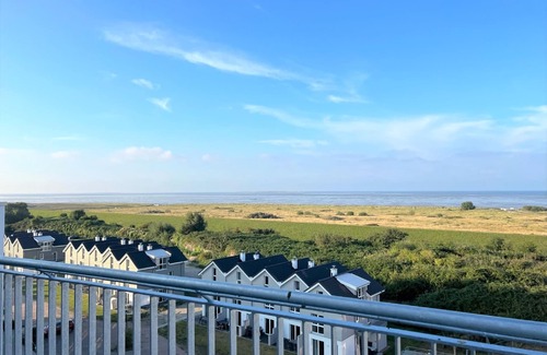 Schillig Apartamento | Modern, high-quality vacation apartment, sauna, large balcony, sea view, close to the beach