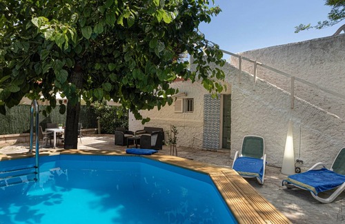 Muro Casa | Moderna casa de vacaciones "Casa Enriqueta" con vistas al mar, jardín, terrazas y piscina