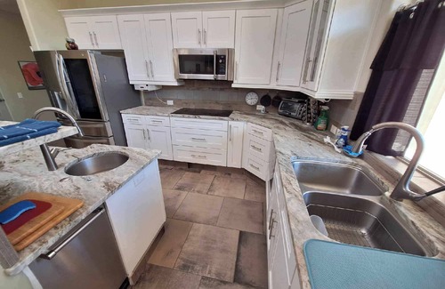 Mesilla Park Casa | Modern home boarding desert wilderness and National Organ Mountain Monument .