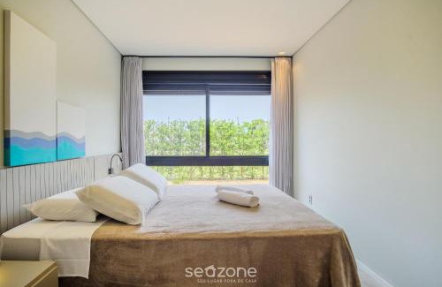 Praia do Rosa Casa | Casa moderna con piscina junto a Surfland ROI009