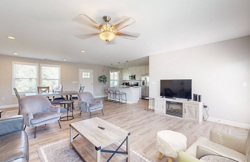 Alexander Casa | Modern interior with fenced yard and firepit - near town