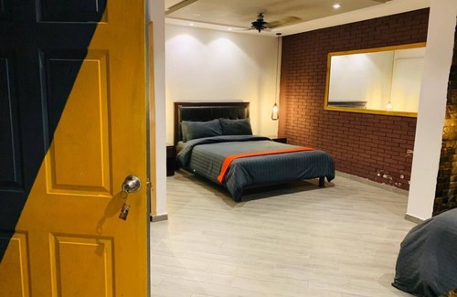 Lahore Hotel | Modern Lahore Retreat with Swimming Pool & Prime City Access.