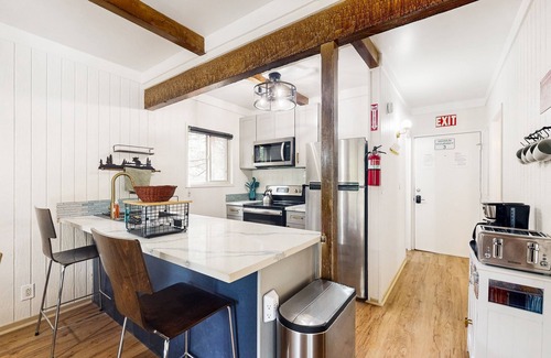 Fish Camp Casa | Modern duplex cabin with fireplace, balcony, & EV charger plus mountain views