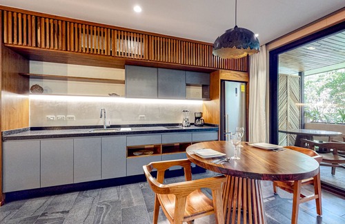 Zama Apartamento | Modern second floor studio with pool, partial AC, and balcony