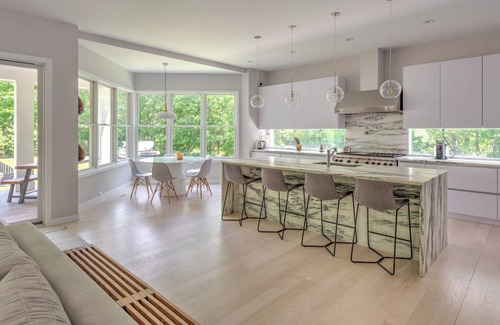Amagansett North Casa | Modern-style home with heated private pool, open-floor plan, ample natural...