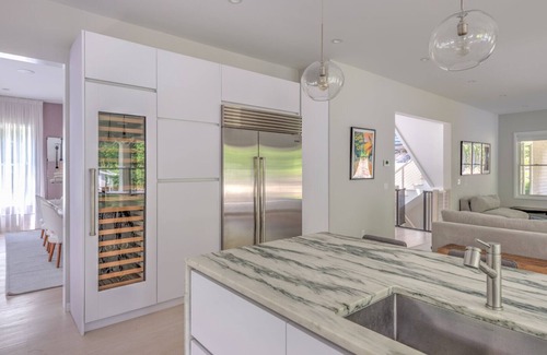 Amagansett North Casa | Modern-style home with heated private pool, open-floor plan, ample natural...