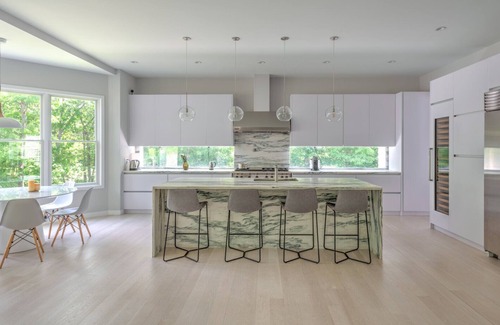 Amagansett North Casa | Modern-style home with heated private pool, open-floor plan, ample natural...