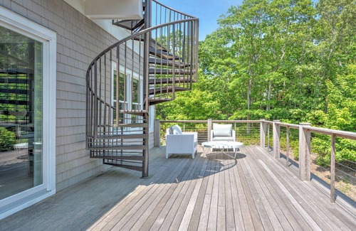 Amagansett North Casa | Modern-style home with heated private pool, open-floor plan, ample natural...