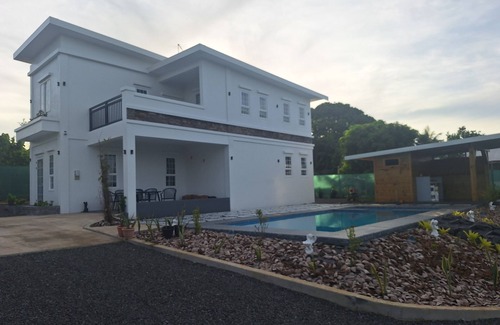 Apia Villa | Modern villa with an elevated landscape overlooking the Ocean. 7 min to Apia