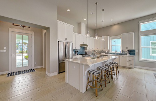 Rockport Casa | Modern, waterfront home with private pool, dock, balconies, central AC, and WiFi