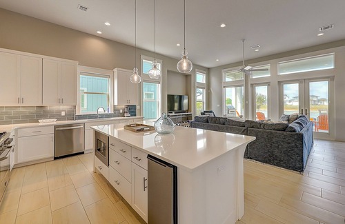 Rockport Casa | Modern, waterfront home with private pool, dock, balconies, central AC, and WiFi