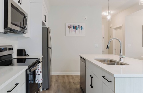 Southwest Calgary Casa | Modern2Bedroom 2BathTownhouse with Garage in Belmont Urban Living at Its Finest
