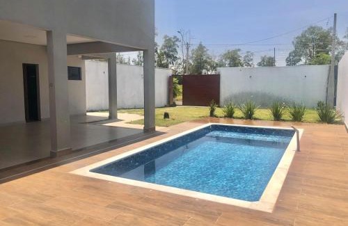Americana Casa | Moderna área com Wi-Fi e ar condicionado