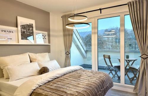 Hessental Apartamento | Modernes Apartment inkl. TG-Stellplatz in der Nähe zum Bahnhof - YUKA Apartments