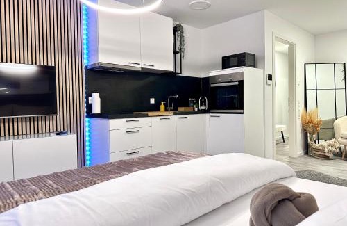 Hessental Apartamento | Modernes Apartment inkl. TG-Stellplatz in der Nähe zum Bahnhof - YUKA Apartments