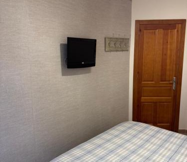 Puebla de Lillo Apartamento | Moderno apartamento a pie de pista en la Estación de San Isidro