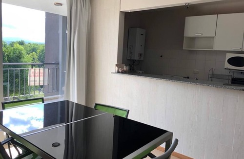 Alta Gracia Apartamento | Condominio Monte Molinos, 1 dormitorio con vista al lago y piscinas, T. Galeon