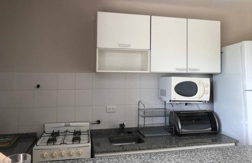 Alta Gracia Apartamento | Condominio Monte Molinos, 1 dormitorio con vista al lago y piscinas, T. Galeon