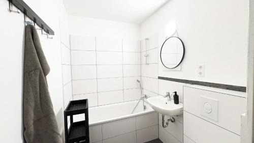 Stadtbezirk West Apartamento | Monteurwohnungen mit TV, Internet, Parkplatz, Waschmaschine, Küche, Balkon, Restaurants und Supermarkt