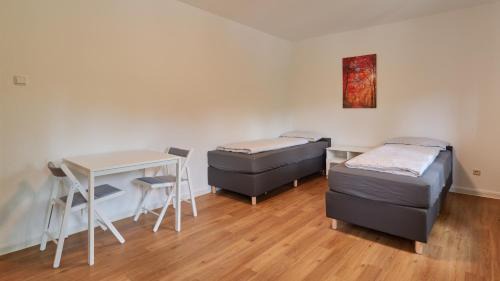 Ehrang-Quint Apartamento | Monteurwohnungen in Trier - Parkplatz - Einzelbetten - Waschmaschine und Trockner