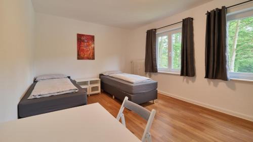 Ehrang-Quint Apartamento | Monteurwohnungen in Trier - Parkplatz - Einzelbetten - Waschmaschine und Trockner