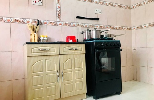 Madina Casa | Moroccan Tile House in Estate by American House Accra