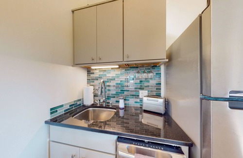 Taos Cabaña | Mountain-view casita with hot tub, pickeball court, walking labyrinth & orchard