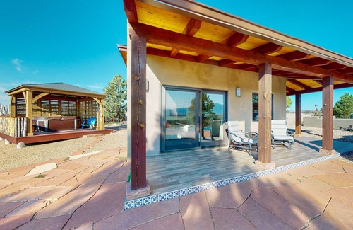 Taos Cabaña | Mountain-view casita with hot tub, pickeball court, walking labyrinth & orchard