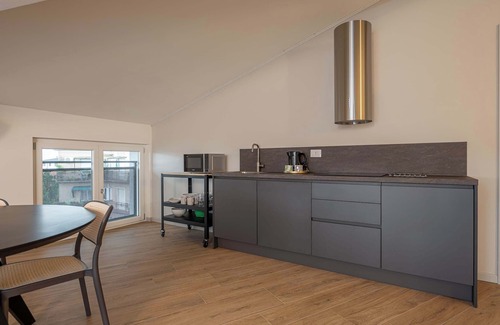 Sud-Ovest Apartamento | MuBra Apartments - Unit 406