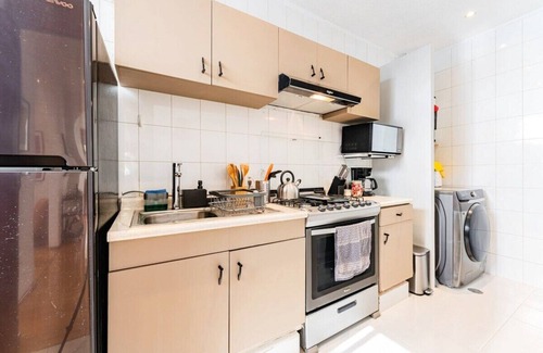 Roma Norte Condominio | Mustard & Pink City Pad, Walk to Medellin Market